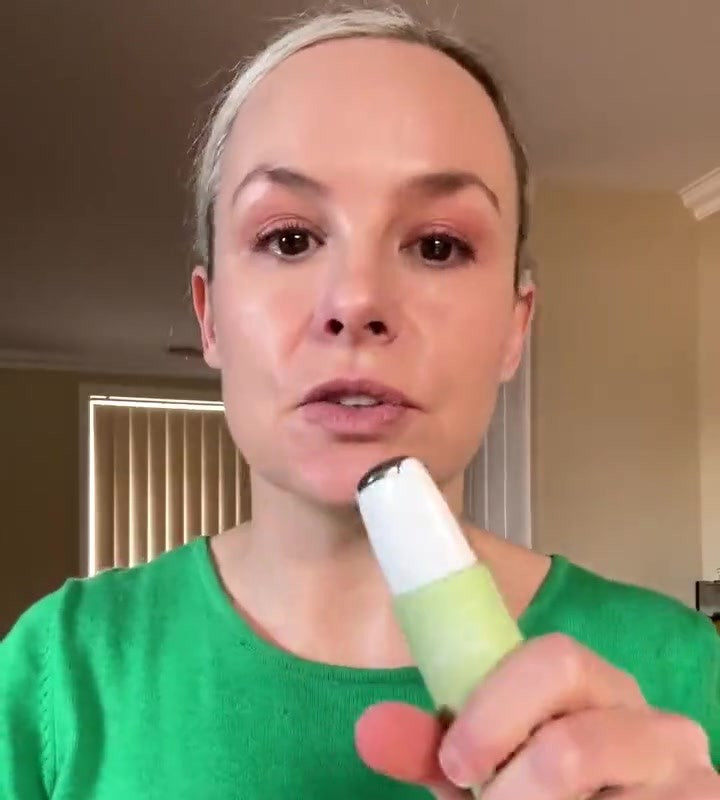 Trudi holding the Hey Bud neck serum roller